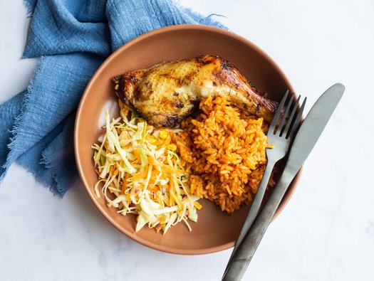 Nigerian jollof rice with jerk chicken