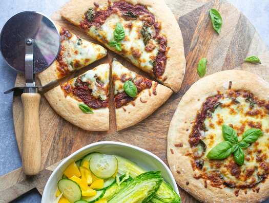 Margherita pizza with side salad