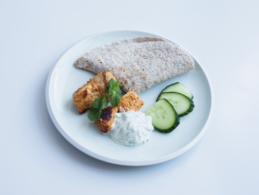 Spicy tandoori chicken with chapati and raita