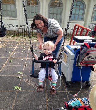 Candace Livingstone - Candace and Elliott at a park near GOSH. Elliott’s Berlin Heart machine is visible