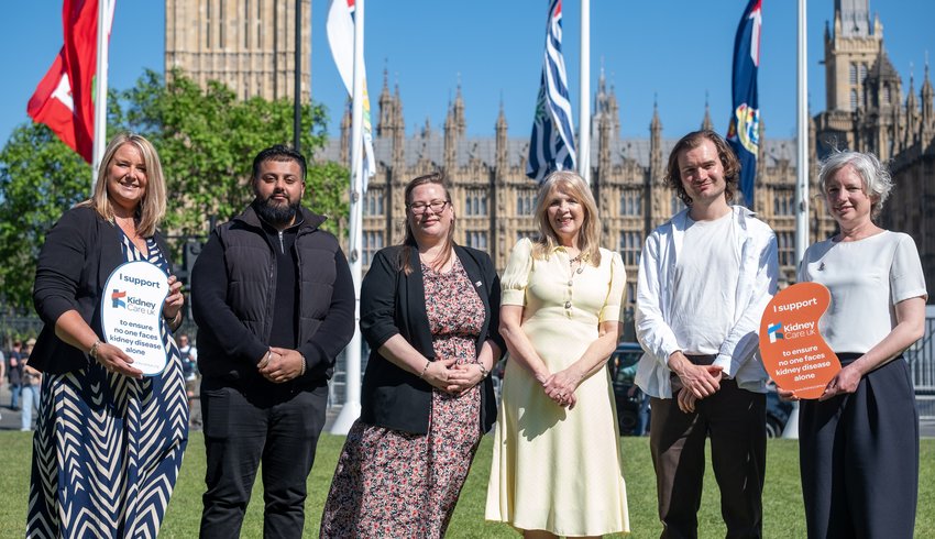 Members of the Kidney Care UK team and kidney patients pictured in in Parliament Square in front of the Houses of Parliament.