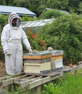 Deirdre Pim - me with my bees