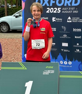 Candace Livingstone - Elliott with his Gold medal in the 2.5k race at the 2025 British Transplant Games in Oxford