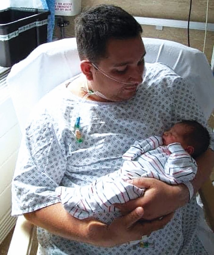 Kate Hyland - Lee post-transplant, holding Harvey