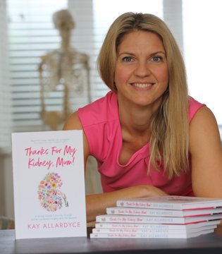 Kay Allardyce - with book