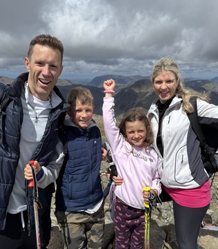 Kay Allardyce - with husband Tim and children at the summit of Scarfell Pike, 2025