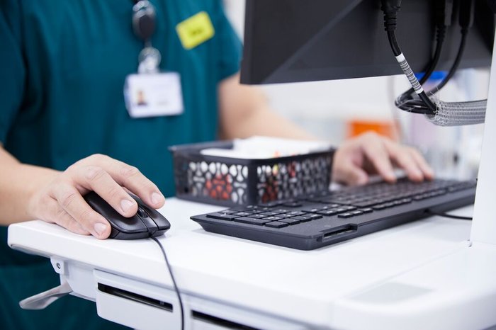 Nurse on computer