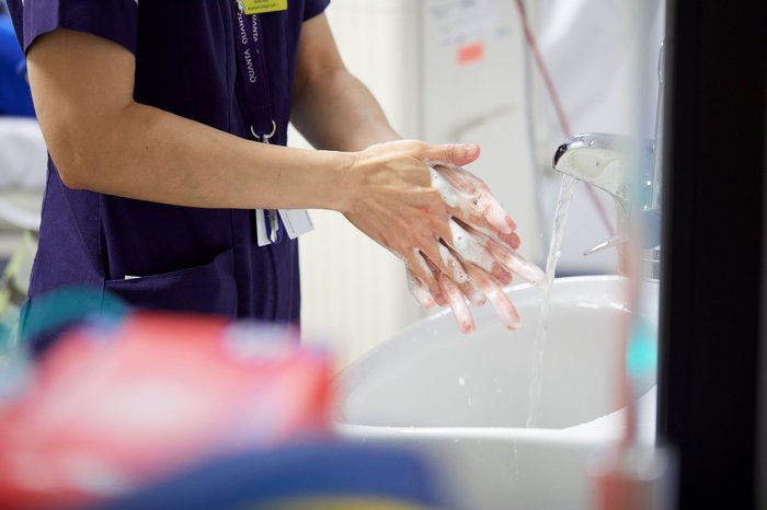 Nurse washing her hands