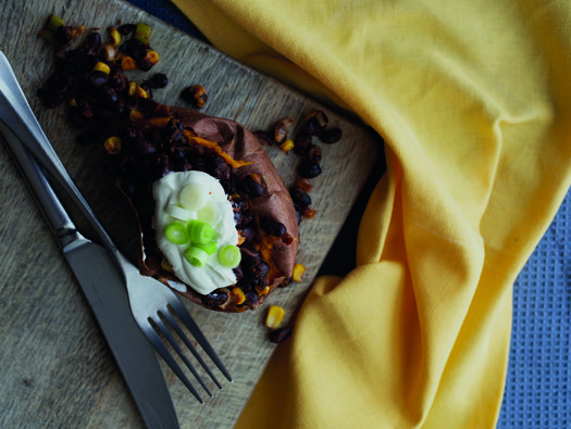 Bean chilli on baked sweet potato