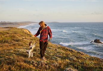 Woman walking with dog