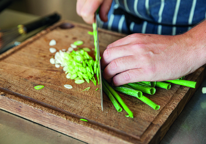 Chopping spring onions