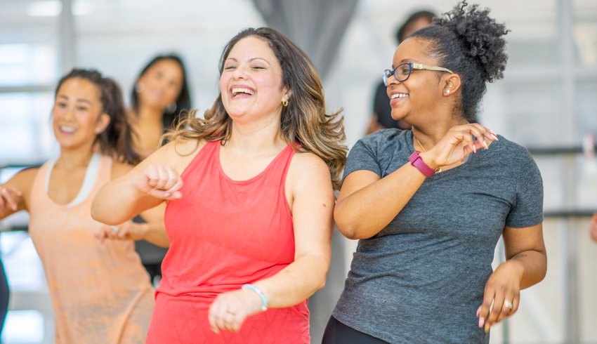 Women dancing and having fun in an exercise class