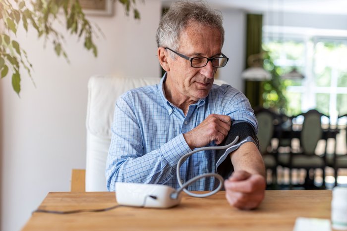 Person checking blood pressure