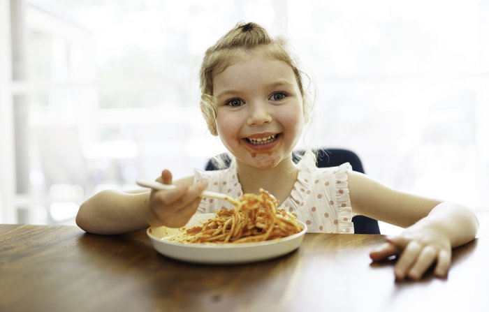 Child eating spaghetti