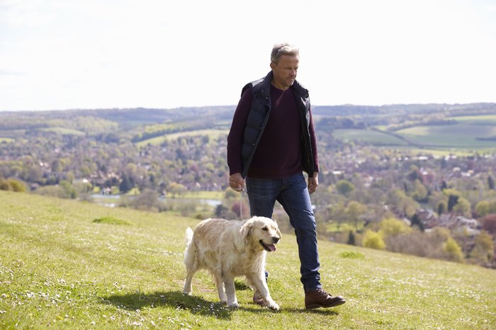 A man walking his dog